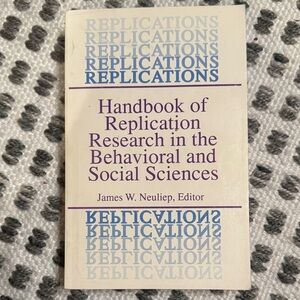 Text-Back Paperback Book - Cream Cover with Purple Text